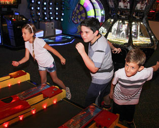 kids-playing-arcade-skee-ball-party